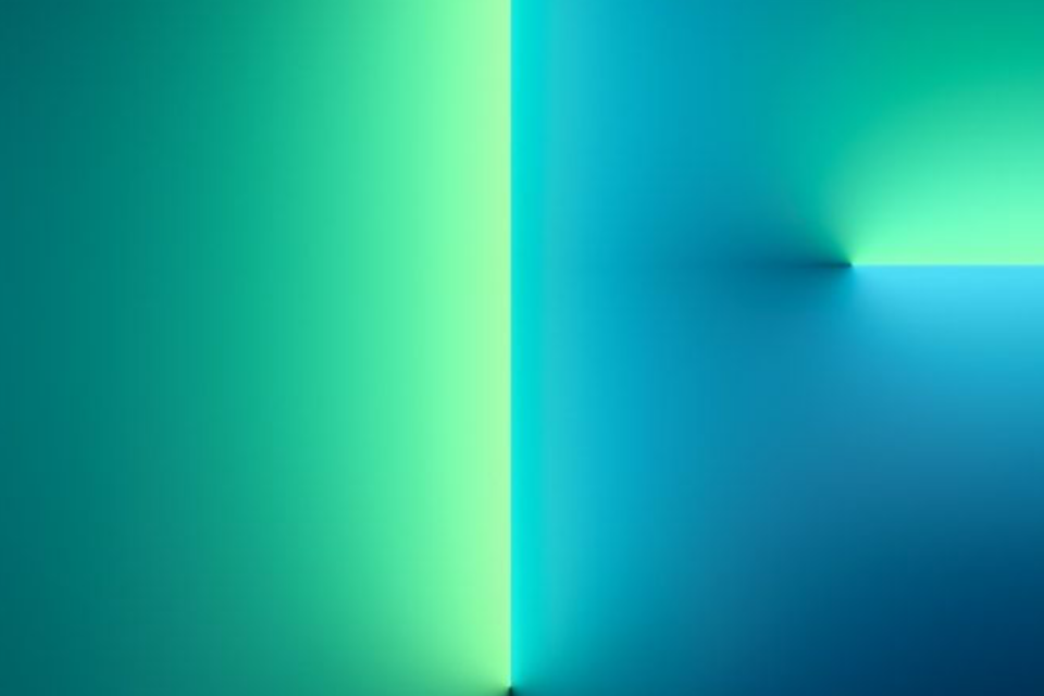 iPhone 13 Pro wallpaper in green and blue lights